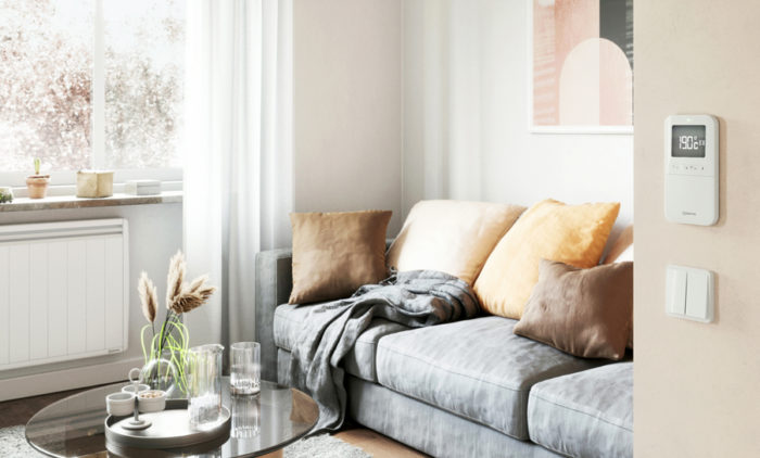 radiateur a inertie programmable avec son thermostat deporte fixe au mur